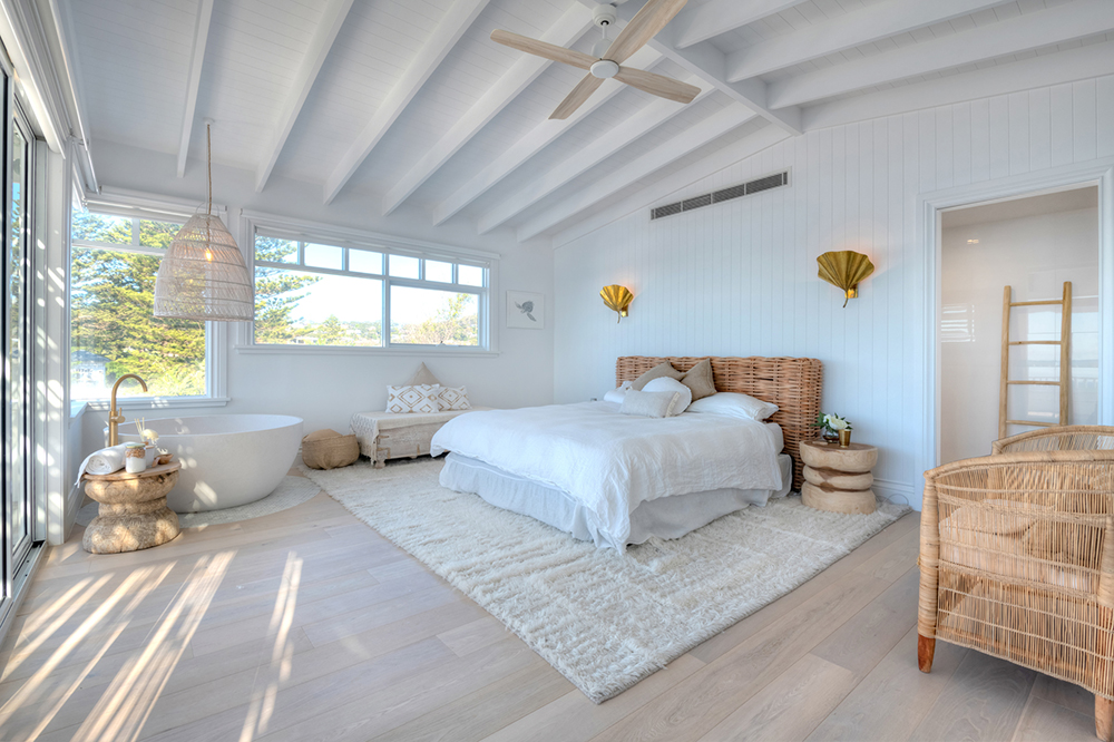 Stunning White Bedroom Overlooking the Beach